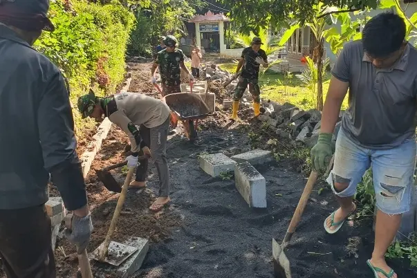 Pembangunan Jalan TMMD 128 Probolinggo di Desa Brabe Melambangkan Kerjasama TNI dan Masyarakat