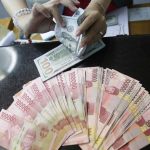 Prediksi Pelemahan Rupiah Terhadap Dolar AS Akibat Sentimen Suku Bunga BI