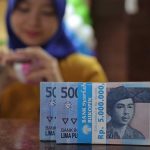 Rupiah Menguat Tipis Setelah Bank Indonesia Naikkan Suku Bunga