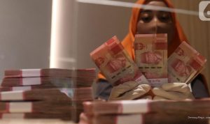 Rupiah Anjlok ke 18.000 per Dolar AS Akibat Konflik AS-Iran