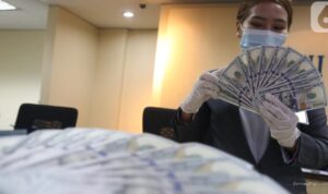Nilai Tukar Rupiah Melemah: Dampak Kebijakan The Fed Hari Ini