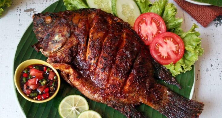 Photo by perumperindo.co.id - Penyebab Daging Ikan Bakar Jadi Kering Keras Alot Kehilangan Juicy Alami