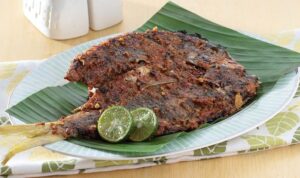 Photo by kompas.com - Trik Menambahkan Jeruk Limau ke Bumbu Oles Sesaat Sebelum Ikan Matang